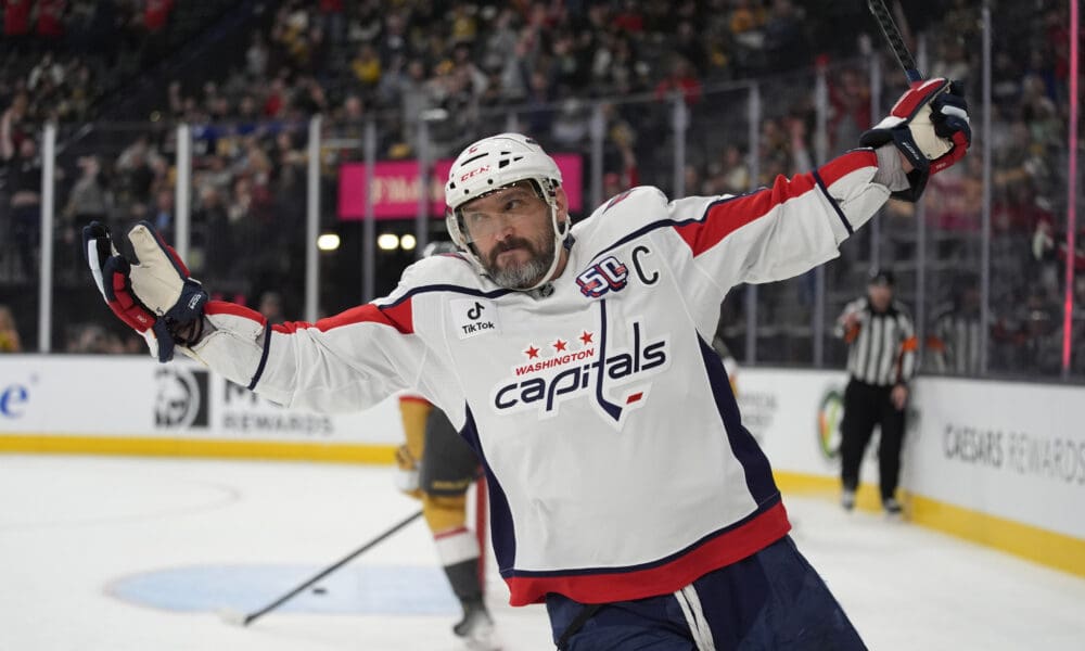 Washington Capitals left wing Alex Ovechkin (8) celebrates after scoring against the Vegas Golden Knights for a hat trick during the third period of an NHL hockey game Sunday, Nov. 17, 2024, in Las Vegas. (AP Photo/John Locher)