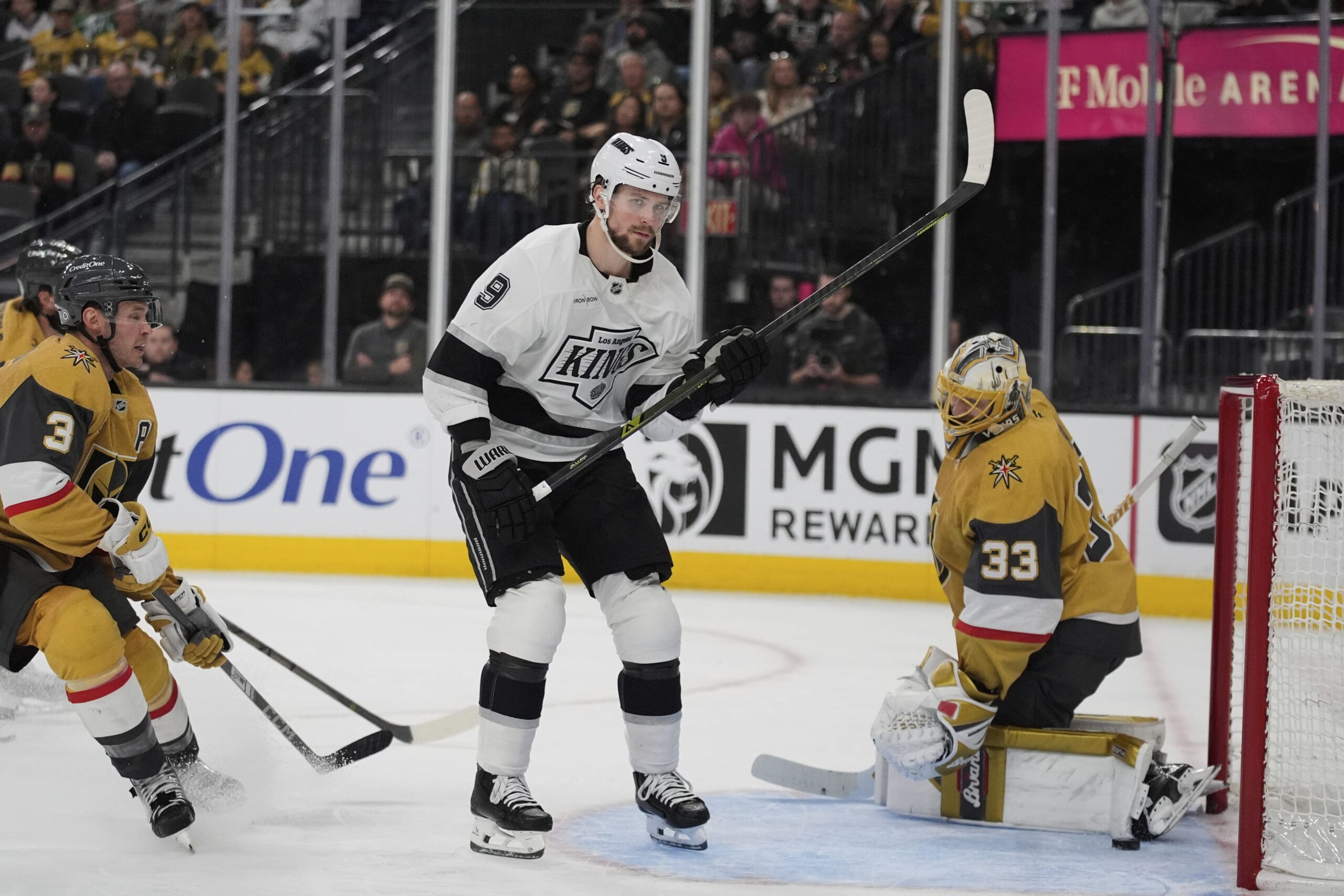 Los Angeles Kings right wing Adrian Kempe (9) scores against Vegas Golden Knights goaltender Adin Hill (33) during the third period of an NHL hockey game Sunday, March 9, 2025, in Las Vegas. (AP Photo/John Locher)