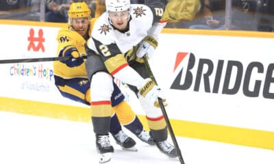 NASHVILLE, TN - MARCH 29: Nashville Predators forward Jonathan Marchessault (81) defends against Vegas Golden Knights defenseman Zach Whitecloud (2) during the NHL game between the Nashville Predators and Vegas Golden Knights, held on March 29, 2025, at Bridgestone Arena in Nashville, Tennessee. (Photo by Danny Murphy/Icon Sportswire)