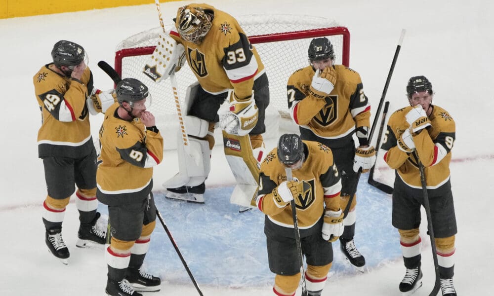 Vegas Golden Knights players react after losing to the Edmonton Oilers in overtime of Game 5 of a second-round NHL hockey playoff series Wednesday, May 14, 2025, in Las Vegas. (AP Photo/John Locher)