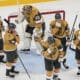 Vegas Golden Knights players react after losing to the Edmonton Oilers in overtime of Game 5 of a second-round NHL hockey playoff series Wednesday, May 14, 2025, in Las Vegas. (AP Photo/John Locher)