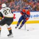 EDMONTON, AB - MAY 12: Las Vegas Golden Knights Defenceman Shea Theodore (27) stops Edmonton Oilers Center Connor McDavid (97) in the first period of the Stanley Cup Playoffs Second Round Edmonton Oilers game versus the Las Vegas Golden Knights on May 12, 2025 at Rogers Place in Edmonton, AB. (Photo by Curtis Comeau/Icon Sportswear)