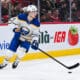 MONTREAL, QC - MARCH 03: Buffalo Sabres defenseman Bowen Byram (4) plays the puck during the Buffalo Sabres versus the Montreal Canadiens game on March 03, 2025, at Bell Centre in Montreal, QC (Photo by David Kirouac/Icon Sportswire)