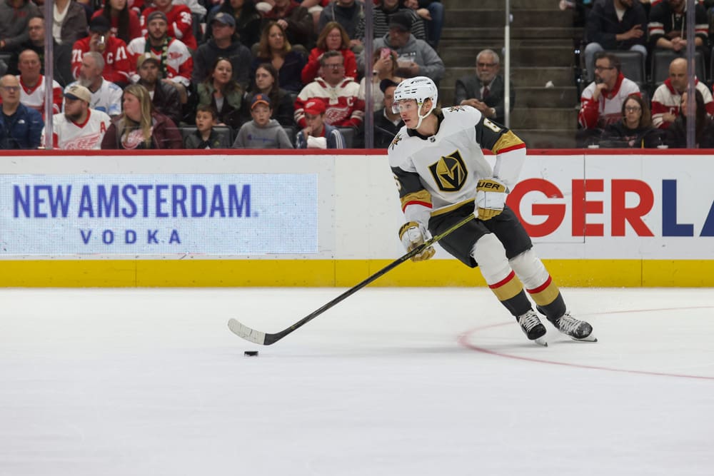 DETROIT, MI - MARCH 16: Vegas Golden Knights defenseman Kaedan Korczak (6) skates with the puck during the second period of an NHL regular season hockey game between the Vegas Golden Knights and the Detroit Red Wings on March 16, 2025 at Little Caesars Arena in Detroit, Michigan. (Photo by Scott W. Grau/Icon Sportswire)