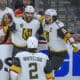 SUNRISE, FL - JUNE 10: Vegas Golden Knights center Chandler Stephenson (20) celebrates scoring a goal with Vegas Golden Knights right wing Mark Stone (61) and Vegas Golden Knights defenseman Zach Whitecloud (2)during Game Four of the NHL Stanley Cup Final between the Vegas Golden Knights and the Florida Panthers on June 10, 2023 at the FLA Live Arena in Sunrise, Florida. (Photo by Doug Murray/Icon Sportswire)