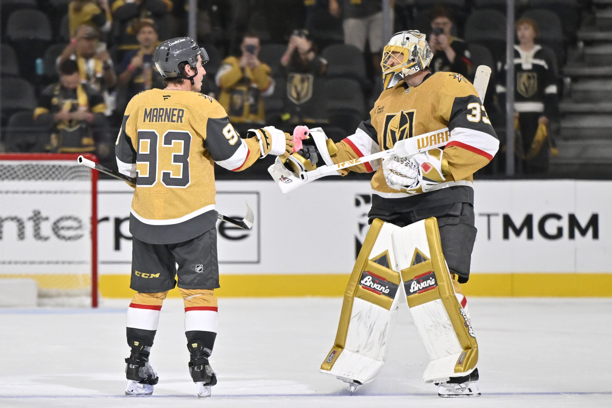 Adin Hill gives the victory flamingo to Mitch Marner 9/25/2025 (Photo/Screenshot- Vegas Golden Knights via Twitter)