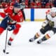 SUNRISE, FL - OCTOBER 25: Florida Panthers center Carter Verhaeghe (23) skates with the puck as Vegas Golden Knights right wing Mitch Marner (93) looks on in the second period during the game between the Golden Knights and the Florida Panthers on Saturday, October 25, 2025 at Amerant Bank Arena in Sunrise, FL.(Photo by Chris Arjoon/Icon Sportswire)