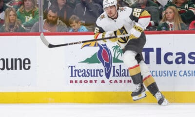ST. PAUL, MN - DECEMBER 15: Vegas Golden Knights right wing Alexander Holtz (26) passes the puck during the NHL game between the Vegas Golden Knights and Minnesota Wild on December 15th, 2024, at the Xcel Energy Center in St. Paul, MN. (Photo by Bailey Hillesheim/Icon Sportswire)