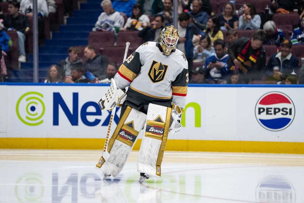 VANCOUVER, BC - APRIL 06: Vegas Golden Knights goaltender Adin Hill (33) waits for a face off during the third period of an NHL game between the Vegas Golden Knights and the Vancouver Canucks on Sunday, April 6, 2025 at Rogers Arena in Vancouver, B.C. (Photo by Ethan Cairns/Icon Sportswire)